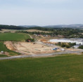 Druhá etapa rozvoje A.W. v Lošticích pokračuje. Dokončená infrastruktura otevírá cestu retail parku i novému výrobnímu závodu